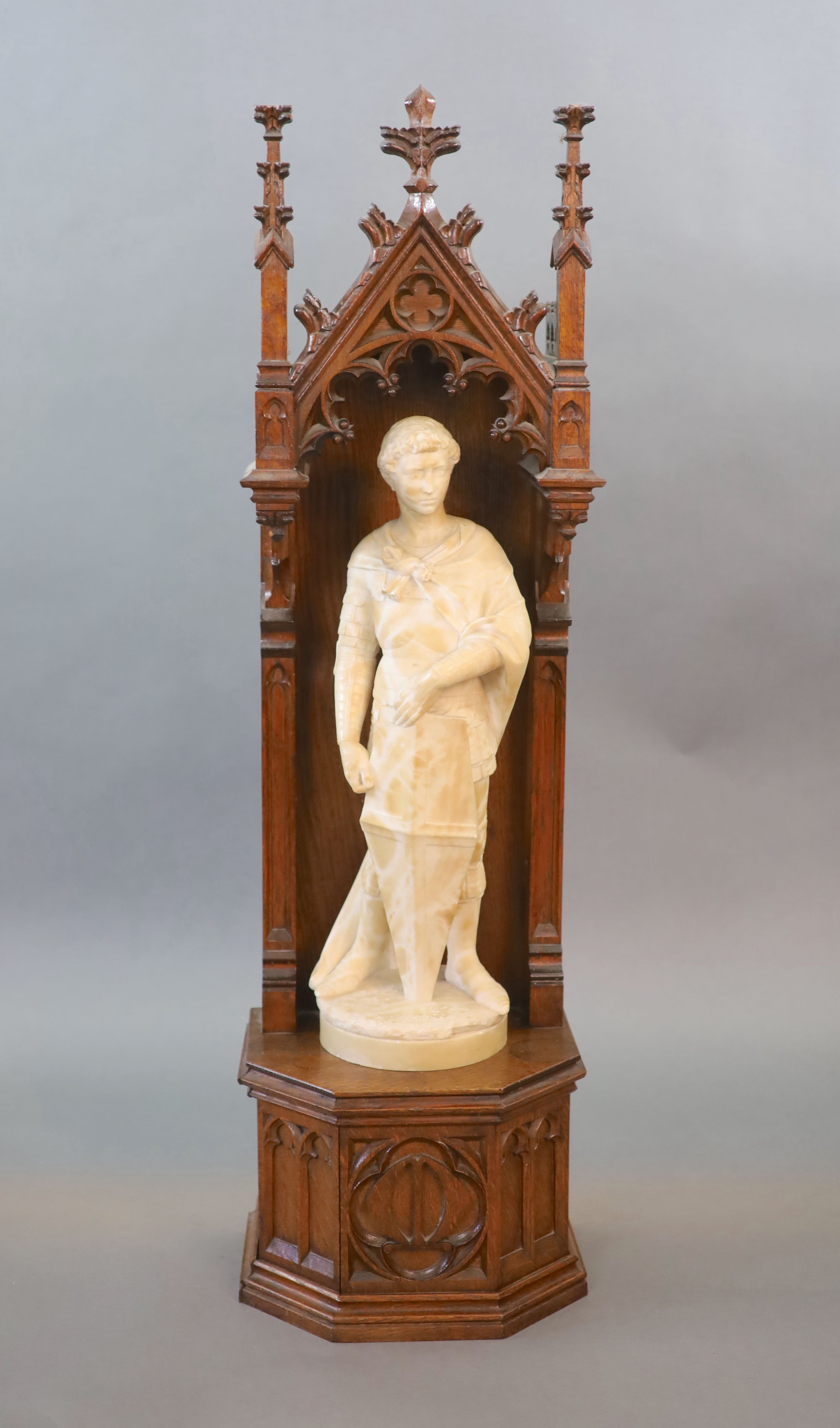 A carved white marble study of a romantically portrayed crusader, 19th century 117 cm high (combined)